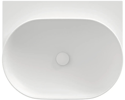 Pohled shora na oválné umyvadlo na desku z keramiky.