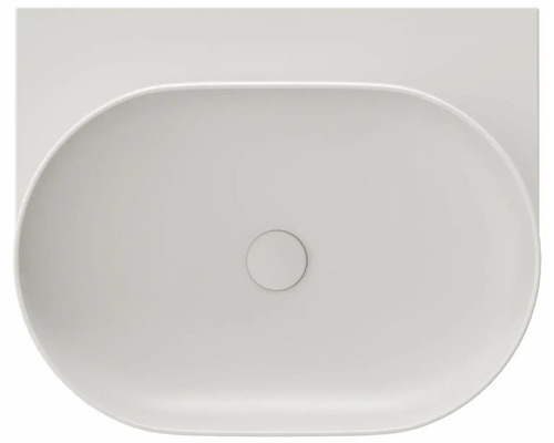 Pohled shora na oválné umyvadlo na desku ze sanitární keramiky