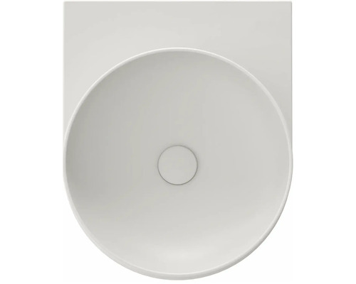 Pohled shora na kulaté umyvadlo na desku