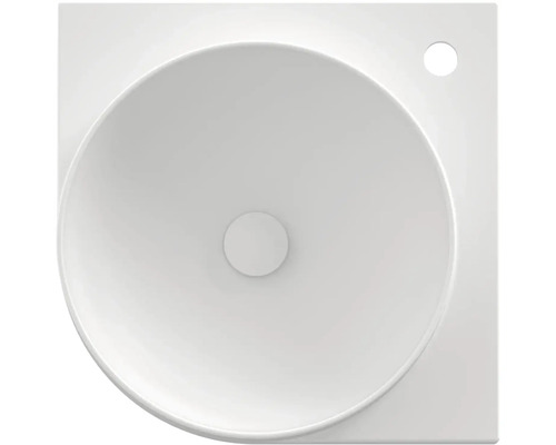 Pohled shora na keramické umyvadlo s kulatou mísou