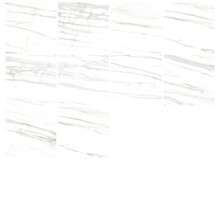 Několik bílých dlaždic s mramorovým vzhledem