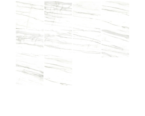 Několik bílých dlaždic s mramorovým vzhledem