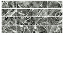 Několik šedých dlaždic s mramorovým vzorem