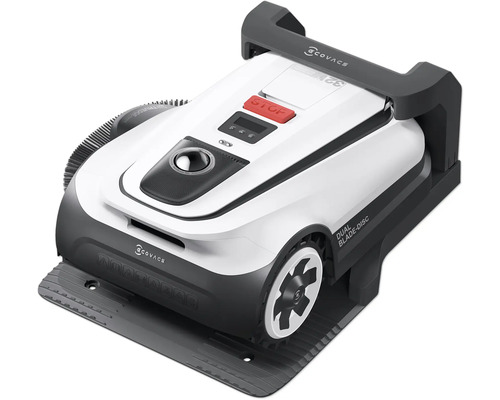 Robotická sekačka na trávu na nabíjecí stanici