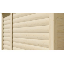 Detail dřevěné stěny ze světlých srubových profilů