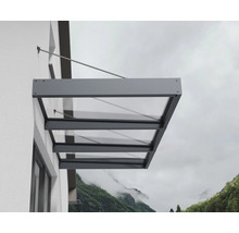 Moderní prosklená stříška s antracitovým hliníkovým rámem, namontovaná na venkovní stěně pomocí táhel.