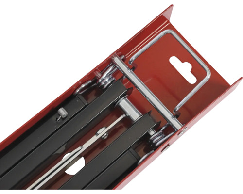 Řezačka dlaždic v červeném přepravním boxu