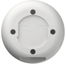 Spodní strana kulatého bílého zařízení se čtyřmi montážními body