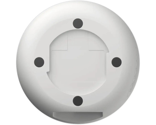 Spodní strana kulatého bílého zařízení se čtyřmi montážními body