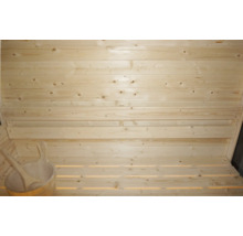 Dřevěná sauna s dřevěným vědrem a dřevěnou lžící