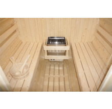 Vnitřní sauna s kamny a vědrem na vodu