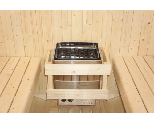 Saunová kamna z nerezové oceli s dřevěným obložením v sauně