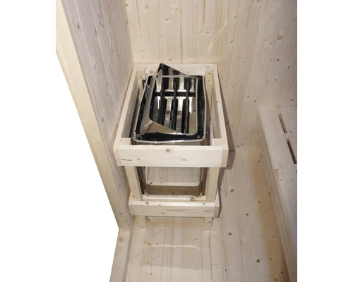 Saunová kamna v dřevěné kabině