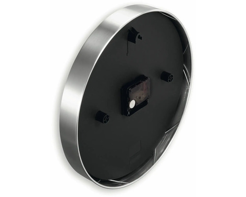 Zadní strana nástěnných hodin s kovovým pouzdrem