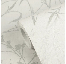 Role vliesové tapety s šedým botanickým vzorem větví a květů a textilní strukturou.