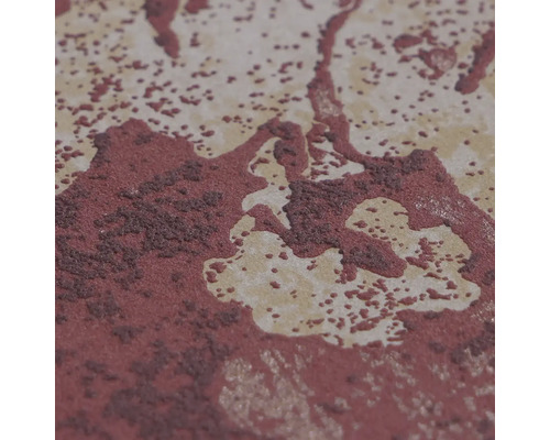 Detailní záběr mramorované povrchové struktury s kropenatými a zrnitými detaily.