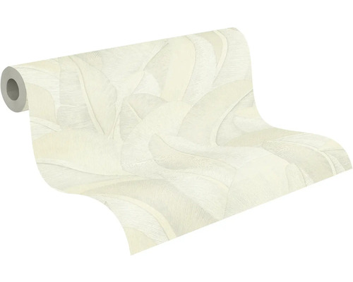 Vliesová tapeta s velkým vzorem listů na roli.