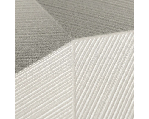 Detail strukturované vliesové tapety s geometrickým vzorem linií a žebrovanou strukturou.