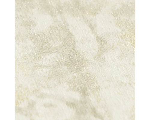 Detail strukturované vliesové tapety s třpytivým efektem a abstraktním vzorem.