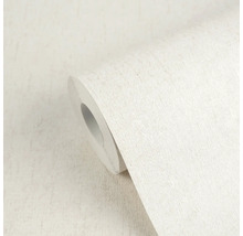 Strukturovaná vliesová tapeta v roli s jemnou povrchovou texturou.