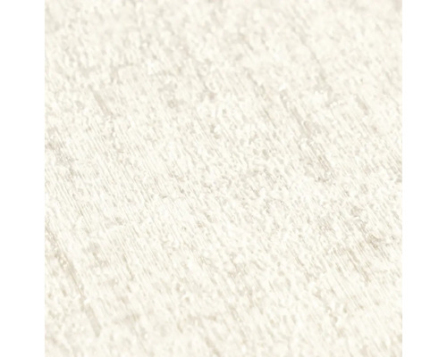 Detailní záběr strukturovaného povrchu s jemným, zrnitým vzorem.