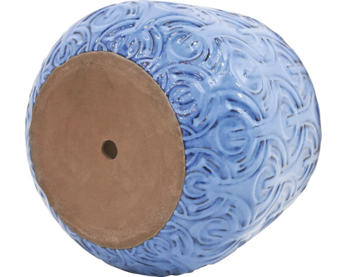 Modrý květináč se vzorem a otvorem ve dně