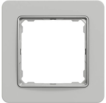 Jednonásobný krycí rám v šedé barvě pro vypínače nebo zásuvky se zaoblenými rohy.