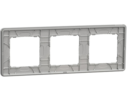 Trojnásobný krycí rám z plastu pro vypínače a zásuvky v šedé barvě, pohled zezadu.