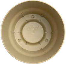 Vnitřní pohled na kulatý plastový květináč s drenážními otvory a elho Logo.