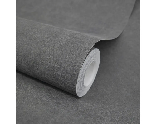 Strukturovaná vliesová tapeta s tmavě šedým vzhledem kamene na roli.