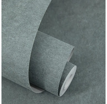 Vliesová tapeta se vzhledem betonu se strukturovaným povrchem, tmavě šedá.