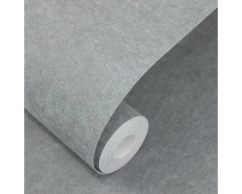 Role šedé vliesové tapety se strukturovaným povrchem.