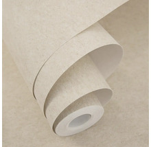 Částečně rozvinutá tapeta s jemně strukturovaným povrchem v dekoru kamene.