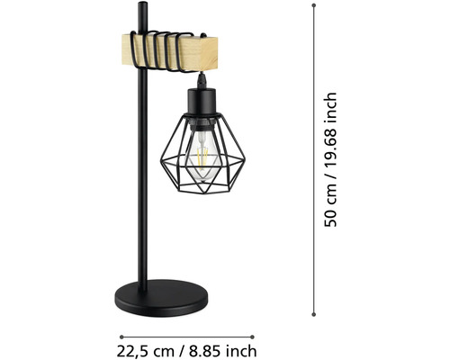 Stolní lampa z černého kovu s dřevěným detailem a geometrickým drátěným stínidlem, výška 50 centimetrů, šířka 22,5 centimetrů.