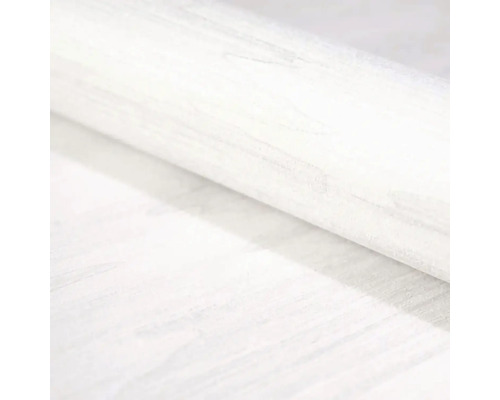 Detailní záběr na roli tapety s texturou bílého dřeva.