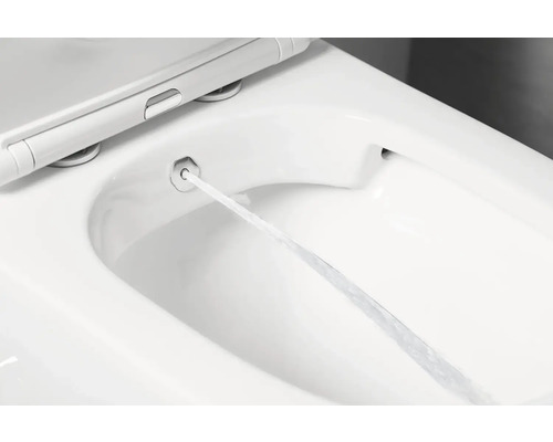 Sprchovací toaletní sedátko s vysunutou čisticí tryskou a aktivním proudem vody.