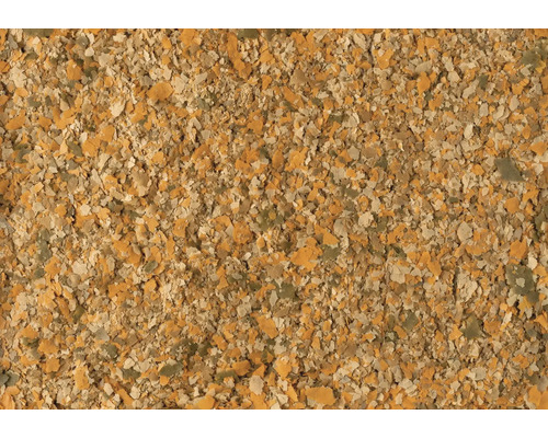 Vločkové krmivo pro akvarijní ryby v různých barvách.