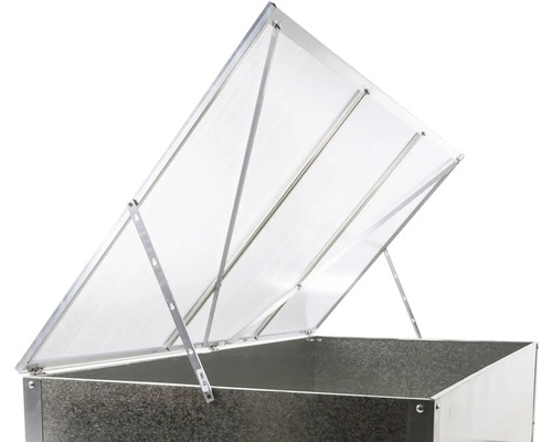 Pařeništní nástavba z hliníku s průhlednými dutinkovými deskami na vyvýšeném záhonu.