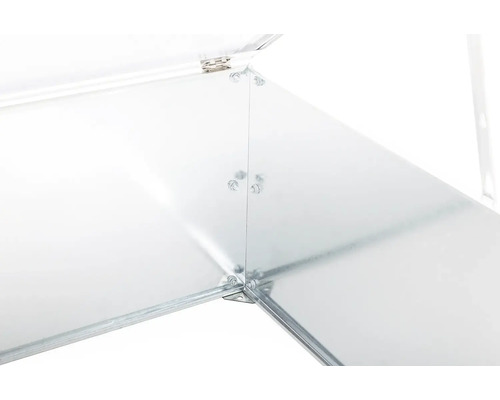 Detailní pohled na vnitřní roh kovového pařeniště se šroubovými spoji a pantem.