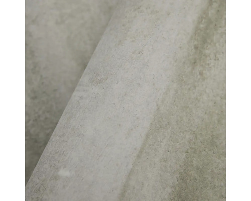 Detailní pohled na tapetu se strukturovaným betonovým efektem.