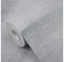 Role vliesové tapety s šedým betonovým vzhledem a strukturovaným povrchem.