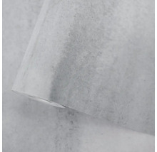 Vliesová tapeta s šedou strukturou v betonovém vzhledu.