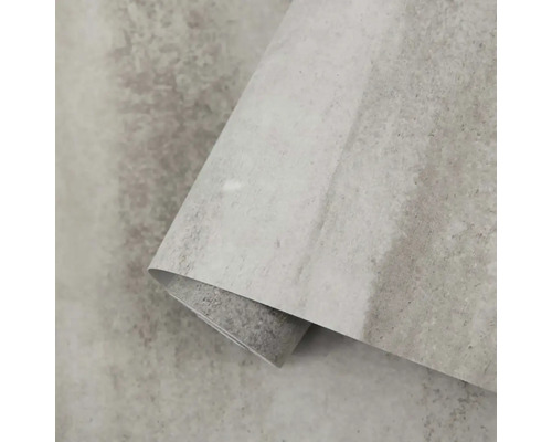 Strukturovaná vliesová tapeta s betonovým vzhledem a matným povrchem ve světle šedé barvě.