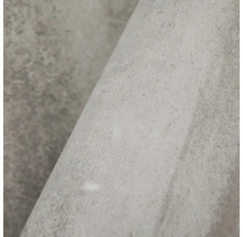 Detailní záběr na matný strukturovaný povrch se vzhledem kamene.