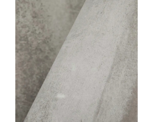 Detailní záběr na matný strukturovaný povrch se vzhledem kamene.