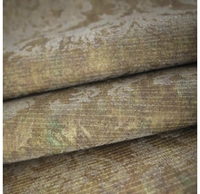 Strukturovaná vliesová tapeta s vintage ornamentálním vzorem a efektem opotřebení.