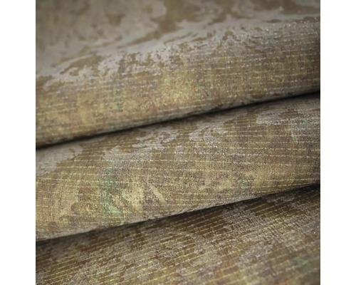 Strukturovaná vliesová tapeta s vintage ornamentálním vzorem a efektem opotřebení.