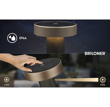 Briloner Logo. Solární stolní lampa s krytím IP44 a dotykovým stmívačem od 10 do 100 procent.
