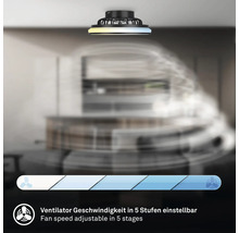 Černý stropní ventilátor s LED světelným kruhem, rychlost ventilátoru nastavitelná v pěti stupních, v moderně zařízeném prostoru.