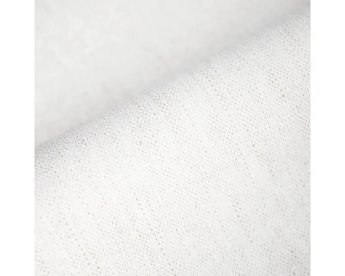 Detailní záběr na bílou texturovanou netkanou textilii.